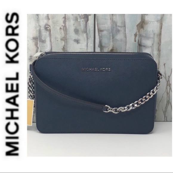 Michael Kors Handbags - NWT Michael Kors jet set travel crossbody navy
